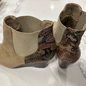 Tan coloured, gently used (not worn in wet weather), size 8